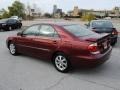 2006 Salsa Red Pearl Toyota Camry XLE  photo #2