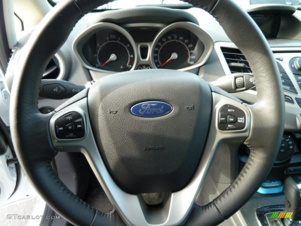 2011 Ford Fiesta SES Hatchback Charcoal Black/Blue Cloth Steering Wheel Photo #42700551