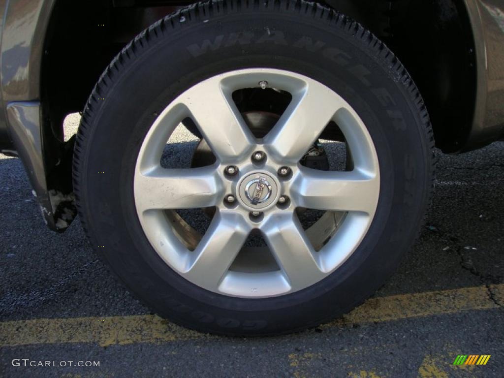 2010 Nissan Titan LE Crew Cab 4x4 Wheel Photos
