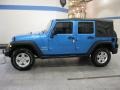 2010 Surf Blue Pearl Jeep Wrangler Unlimited Sport 4x4  photo #4