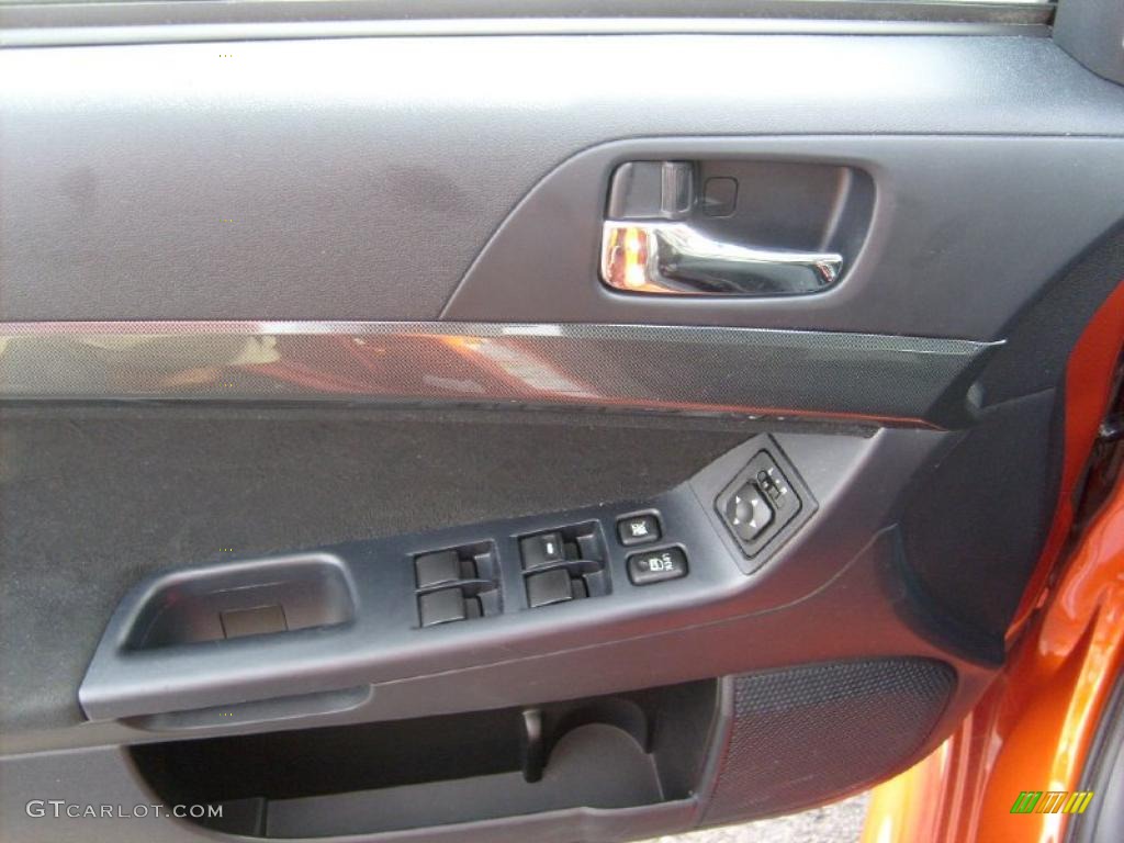 2010 Lancer GTS - Rotor Glow Orange Metallic / Black photo #12