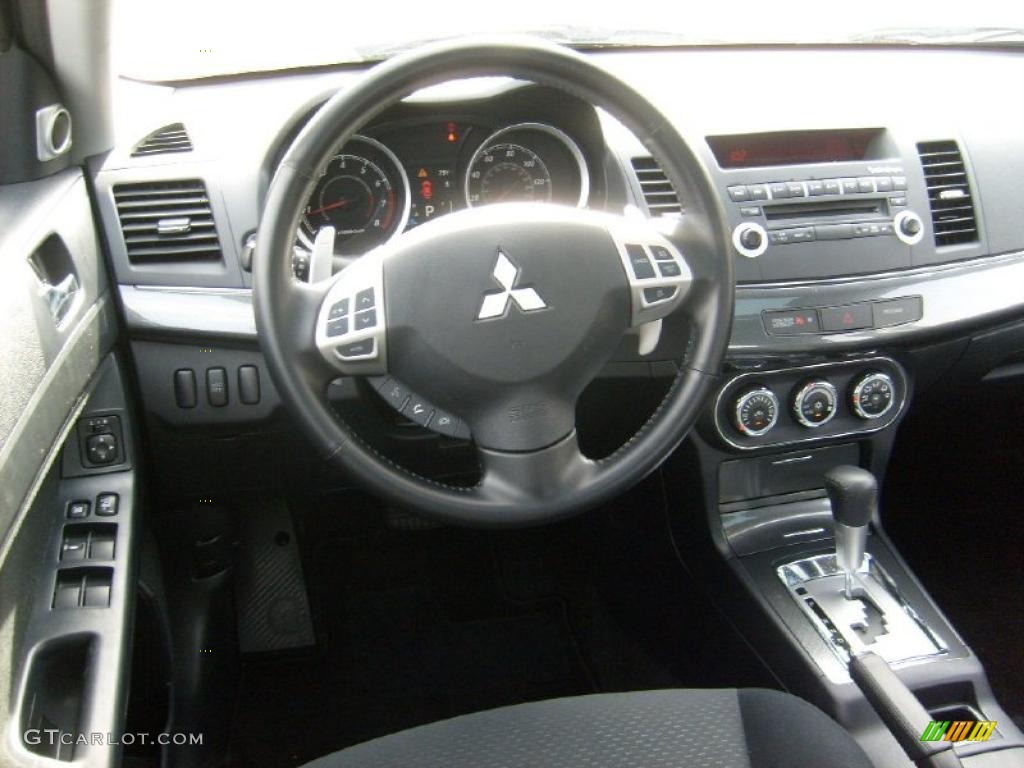 2010 Lancer GTS - Rotor Glow Orange Metallic / Black photo #14