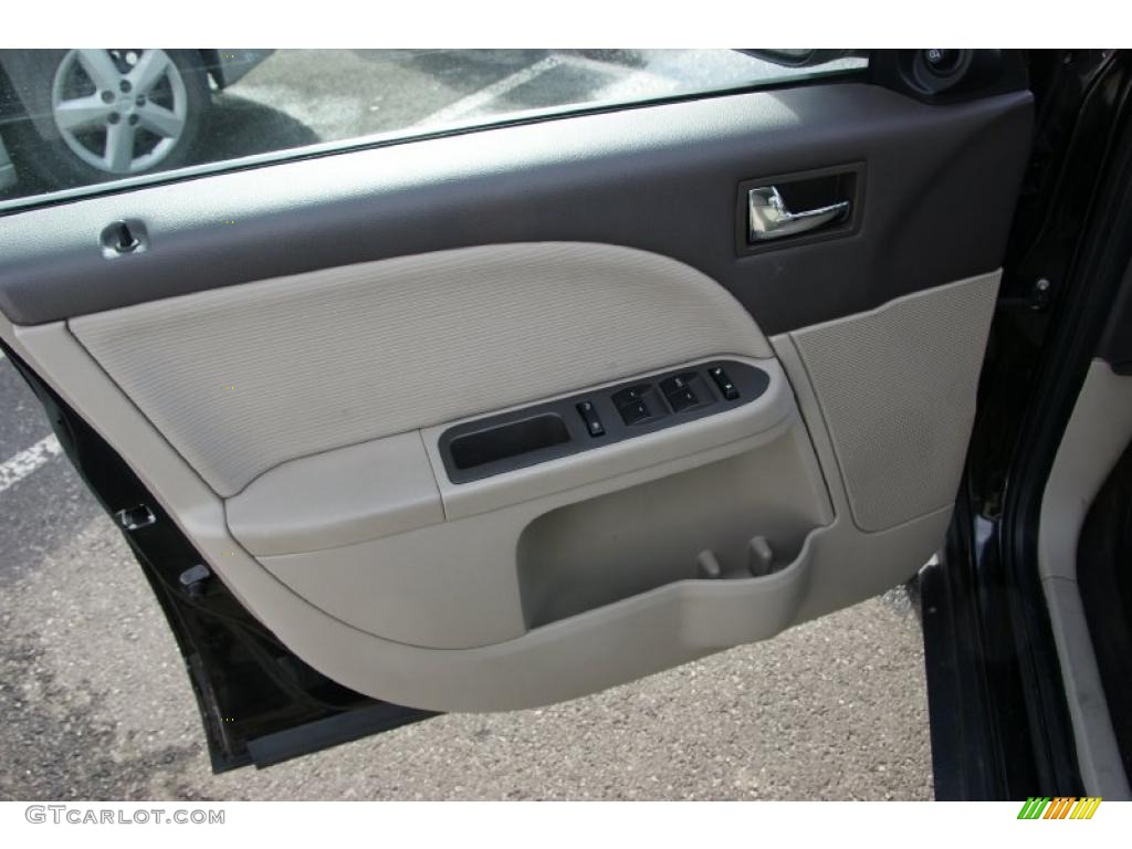 2008 Ford Taurus SEL AWD Medium Light Stone Door Panel Photo #42819066