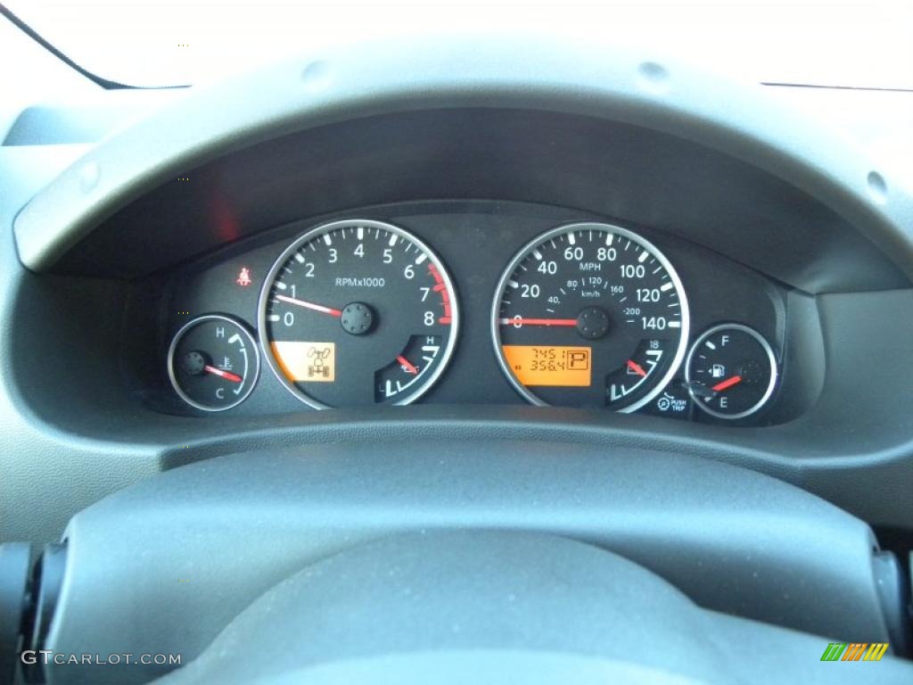 2010 Nissan Xterra SE 4x4 Gauges Photo #42953623