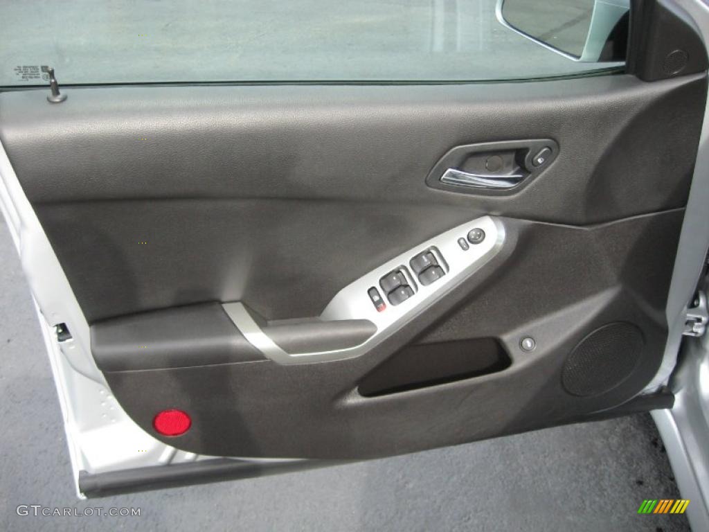 2010 Pontiac G6 Sedan Ebony Door Panel Photo #42960011
