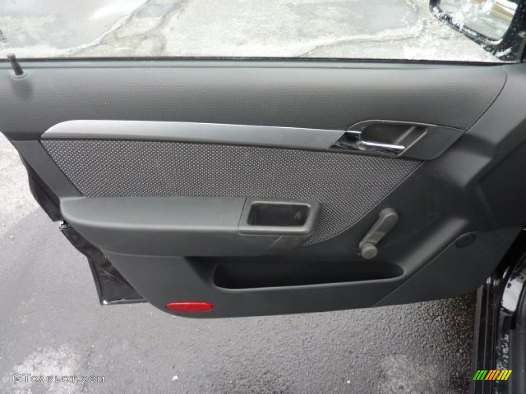 2011 Chevrolet Aveo LT Sedan Charcoal Door Panel Photo #42960463