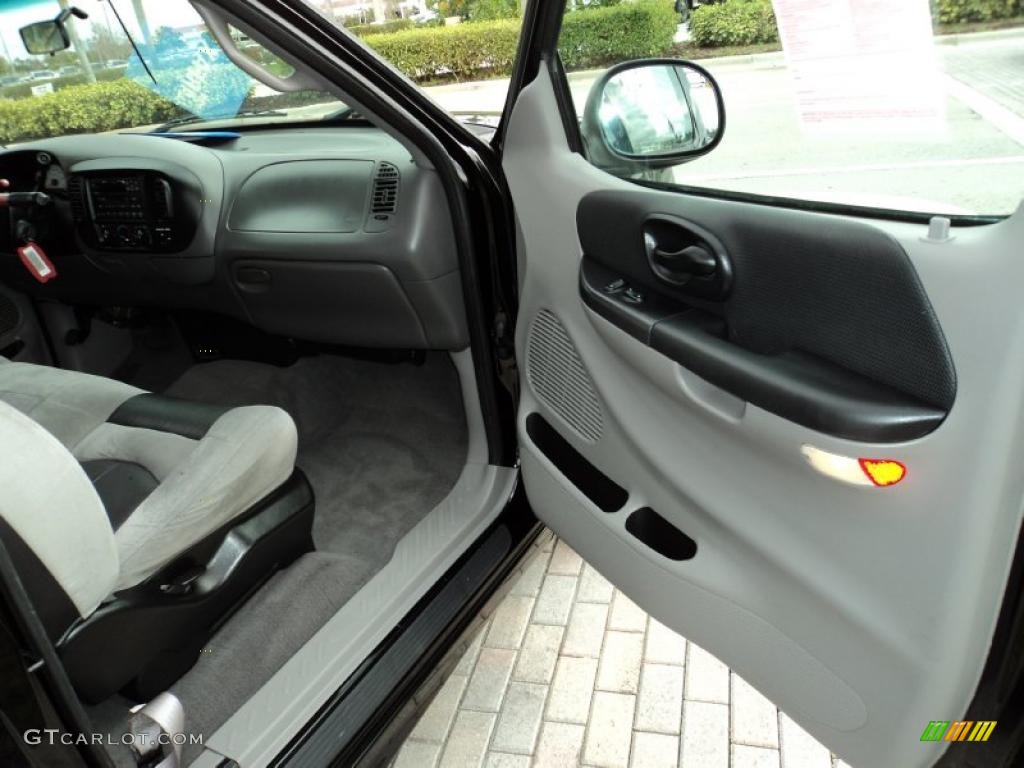 2001 Ford F150 SVT Lightning Lightning Graphite/Black Door Panel Photo #42979741