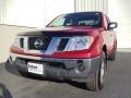 Red Brick 2010 Nissan Frontier SE Crew Cab 4x4