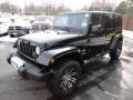 Front 3/4 View of 2011 Wrangler Unlimited Sahara 4x4