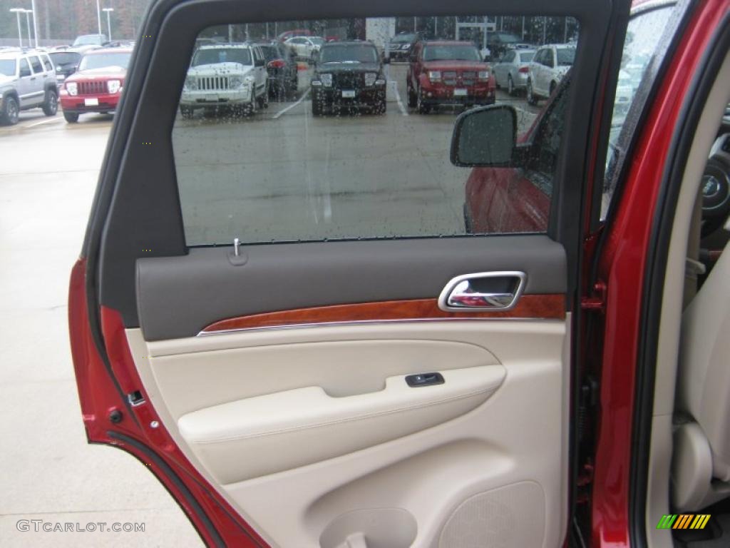2011 Jeep Grand Cherokee Overland Dark Frost Beige/Light Frost Beige Door Panel Photo #43118765