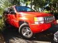1998 Flame Red Jeep Grand Cherokee Laredo 4x4  photo #1