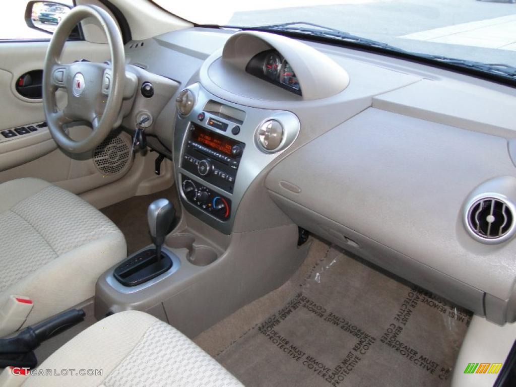 2007 Saturn ION 2 Sedan Tan Dashboard Photo #43169317