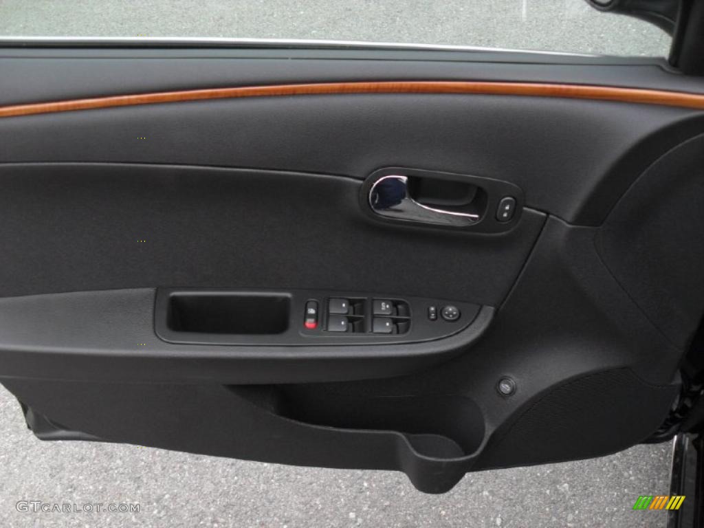 2011 Chevrolet Malibu LT Ebony Door Panel Photo #43271250
