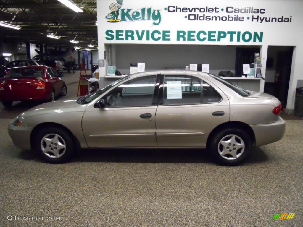 2004 Cavalier Sedan - Sandrift Metallic / Graphite photo #1