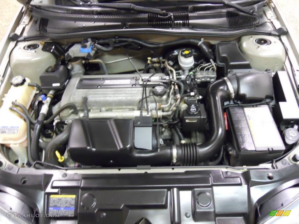 2004 Cavalier Sedan - Sandrift Metallic / Graphite photo #22