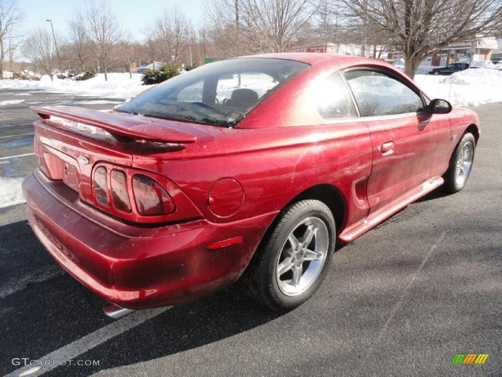 Laser Red Metallic 1995 Ford Mustang GT Coupe Exterior Photo #43314887