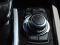 Oyster/Black Nappa Leather Controls Photo for 2010 BMW 7 Series #43323820