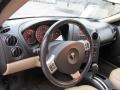 Bronzestone Metallic - Grand Prix GT Sedan Photo No. 9
