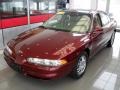 2000 Ruby Red Metallic Oldsmobile Intrigue GL #43339546