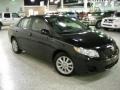 2009 Black Sand Pearl Toyota Corolla LE  photo #5