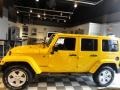 2011 Detonator Yellow Jeep Wrangler Unlimited Sahara 4x4  photo #2