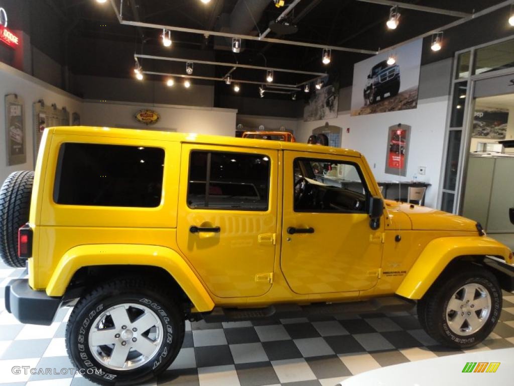 2011 Wrangler Unlimited Sahara 4x4 - Detonator Yellow / Black photo #6