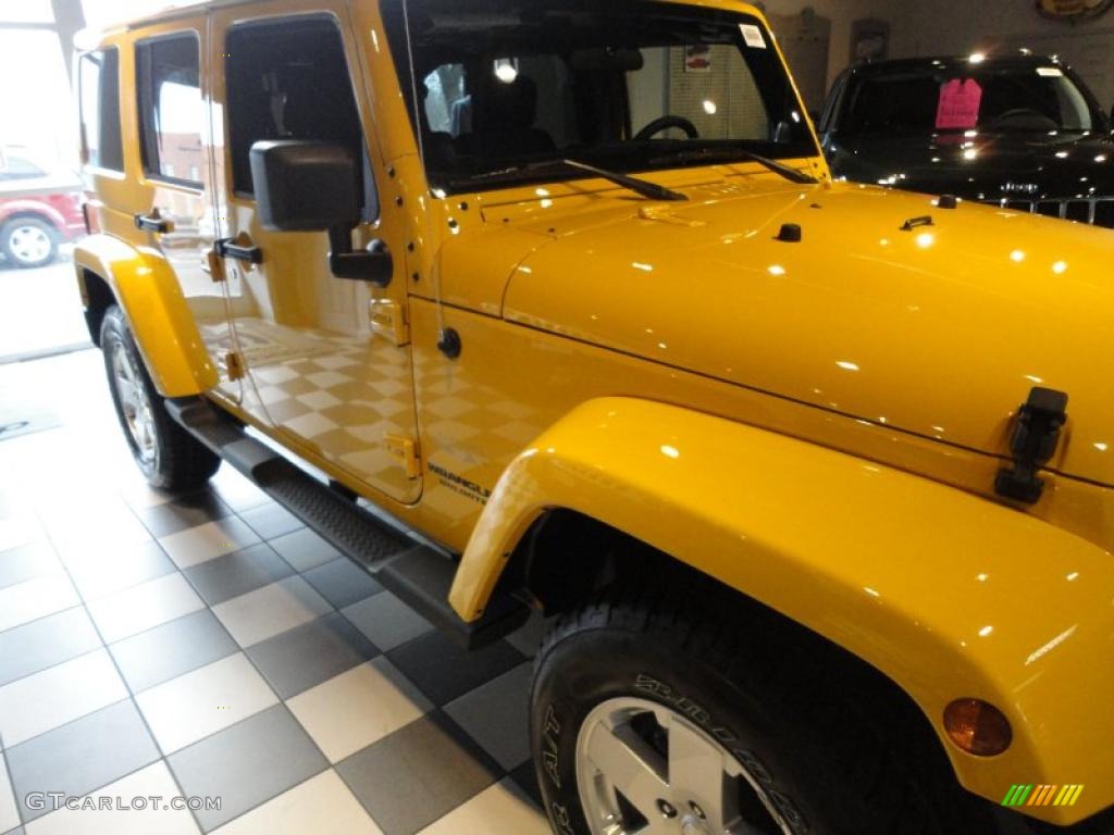 2011 Wrangler Unlimited Sahara 4x4 - Detonator Yellow / Black photo #15