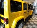 2011 Detonator Yellow Jeep Wrangler Unlimited Sahara 4x4  photo #16