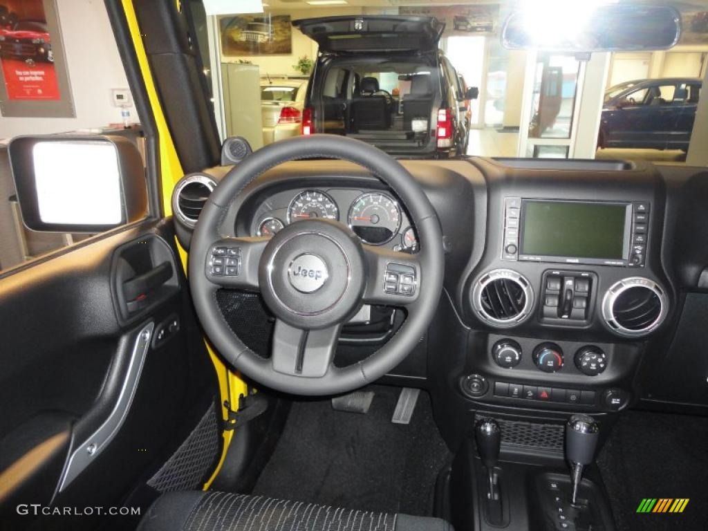 2011 Jeep Wrangler Unlimited Sahara 4x4 Black Dashboard Photo #43388771