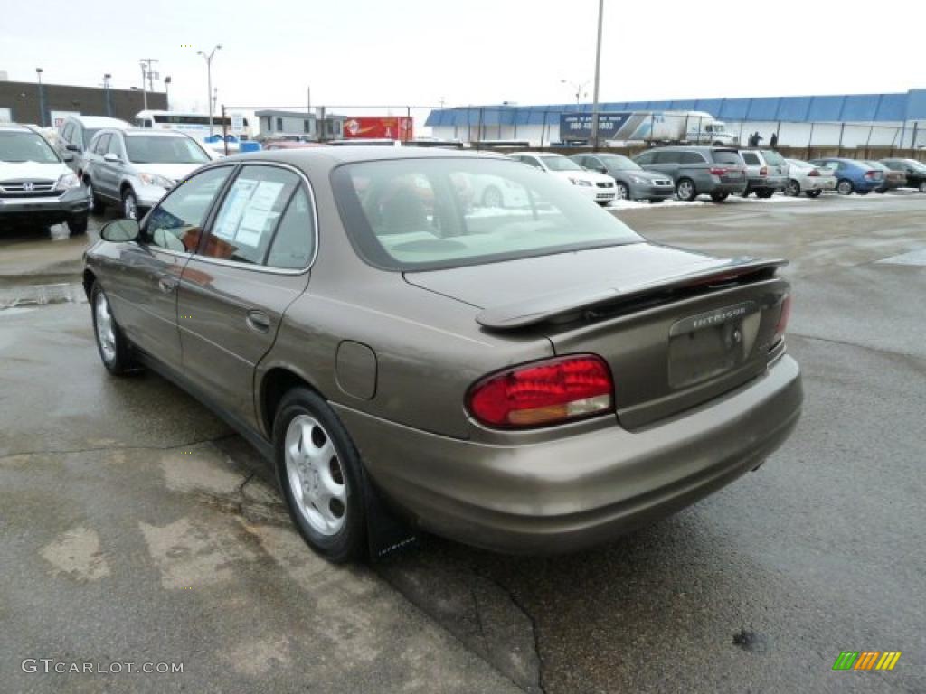 Bronzemist Metallic 1999 Oldsmobile Intrigue GX Exterior Photo #43393436