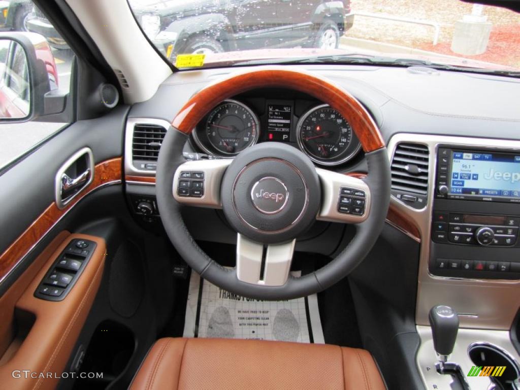 2011 Jeep Grand Cherokee Overland New Saddle/Black Steering Wheel Photo #43462688