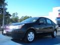 2011 Ebony Black Ford Focus S Sedan  photo #1