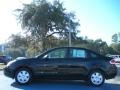 2011 Ebony Black Ford Focus S Sedan  photo #2