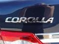 2011 Toyota Corolla LE Badge and Logo Photo