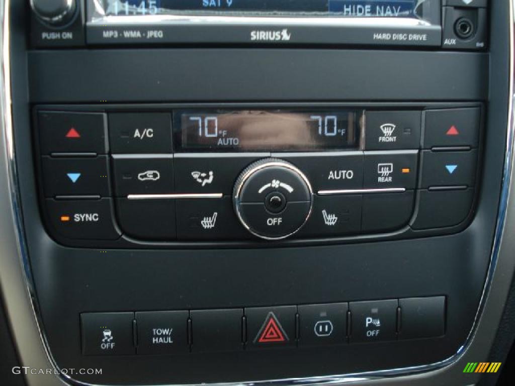 2011 Jeep Grand Cherokee Laredo X Package 4x4 Controls Photo #43545644