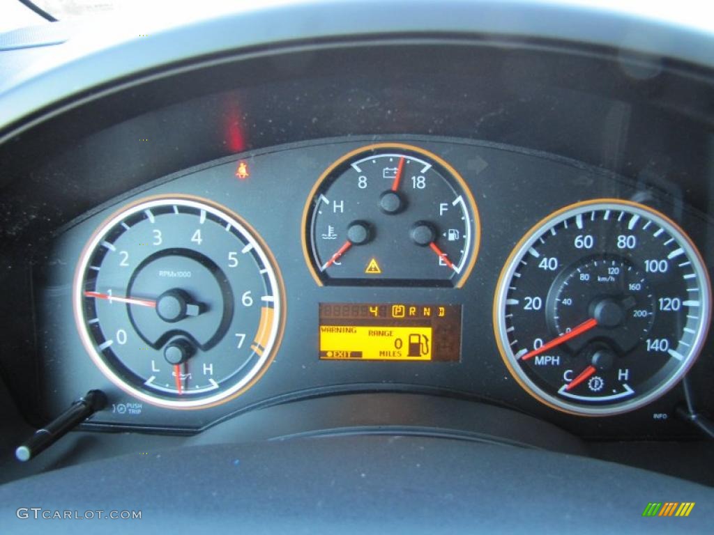 2011 Nissan Titan SV Crew Cab Gauges Photo #43564398