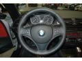 2011 BMW 1 Series Coral Red Interior Steering Wheel Photo