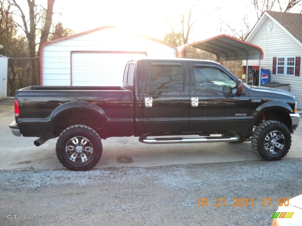 2003 F250 Super Duty Lariat Crew Cab 4x4 - Black / Medium Flint Grey photo #1