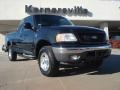 2000 Black Ford F150 XLT Extended Cab 4x4  photo #1