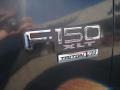 2000 Black Ford F150 XLT Extended Cab 4x4  photo #34