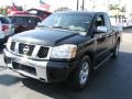 Galaxy Black - Titan SE King Cab Photo No. 5