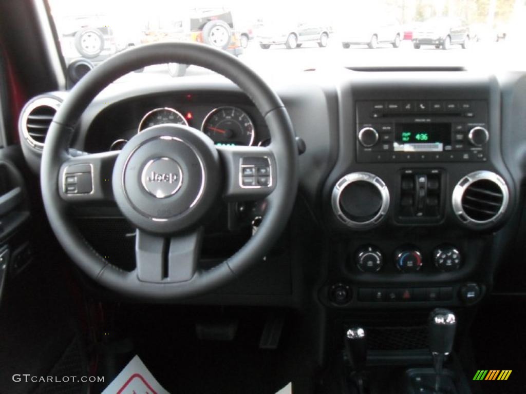 2011 Wrangler Unlimited Sahara 4x4 - Deep Cherry Red / Black photo #17