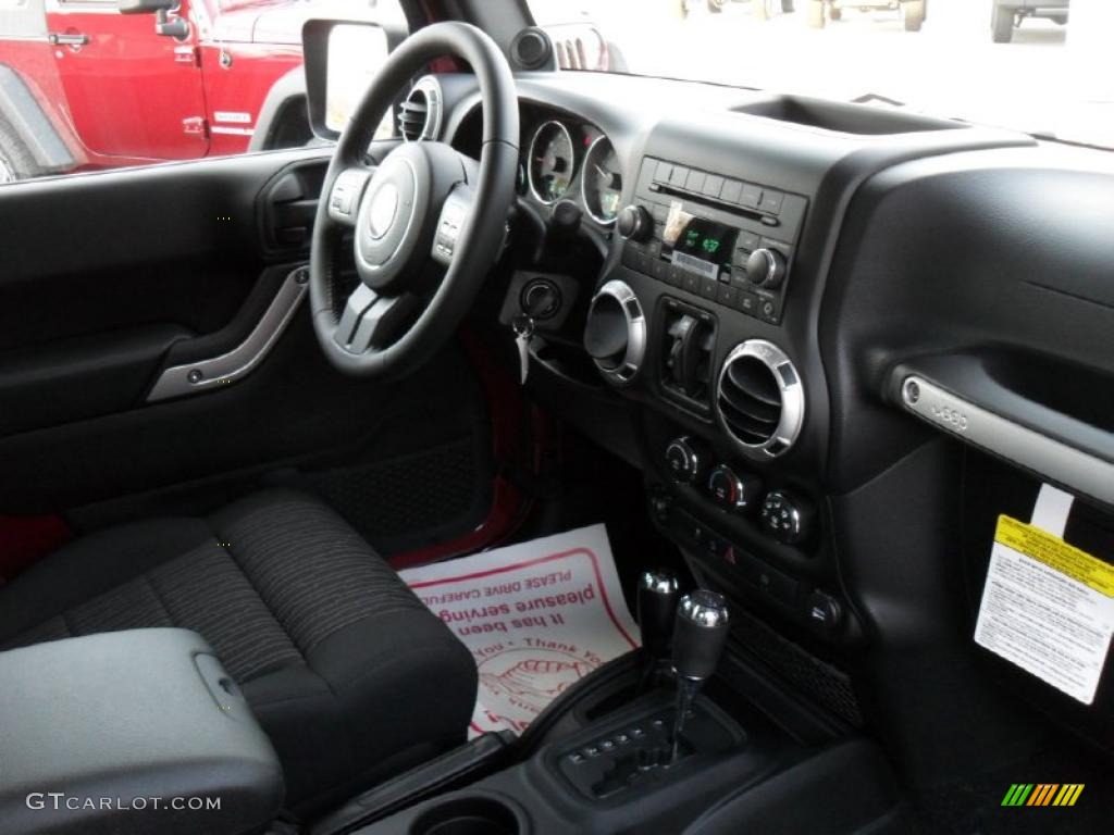 2011 Wrangler Unlimited Sahara 4x4 - Deep Cherry Red / Black photo #22