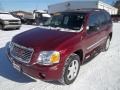 2009 Red Jewel GMC Envoy SLT  photo #1