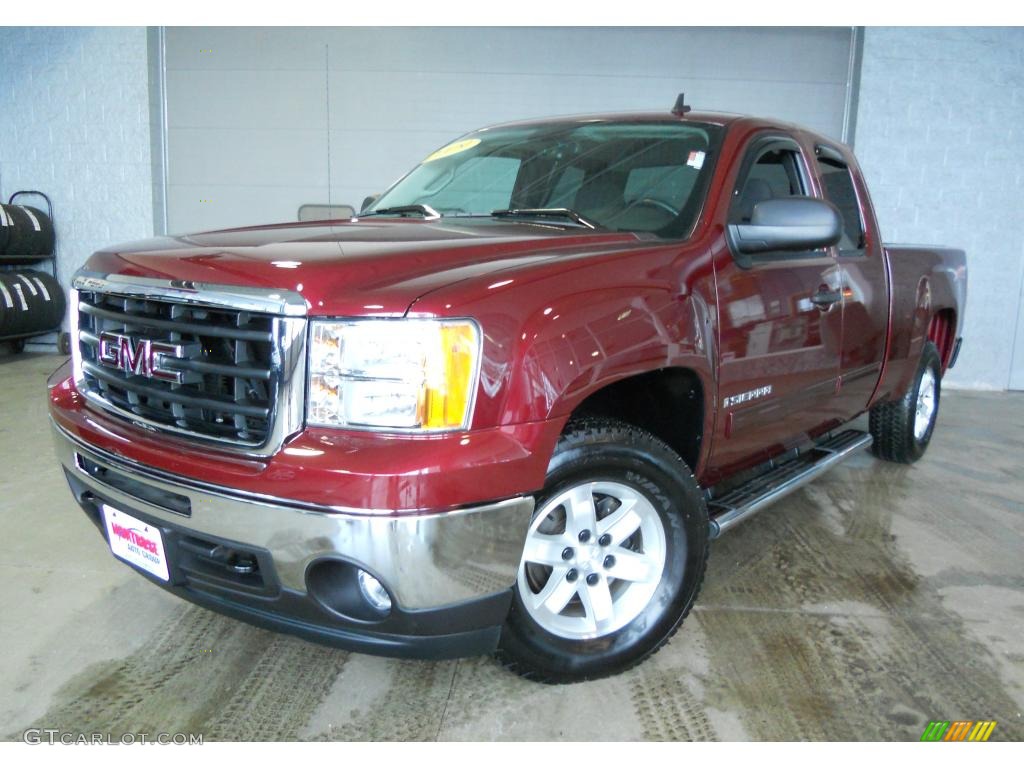 2009 Sierra 1500 SLE Extended Cab 4x4 - Sonoma Red Metallic / Ebony photo #1