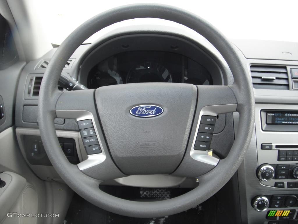 2011 Ford Fusion SE V6 Medium Light Stone Steering Wheel Photo #43926770