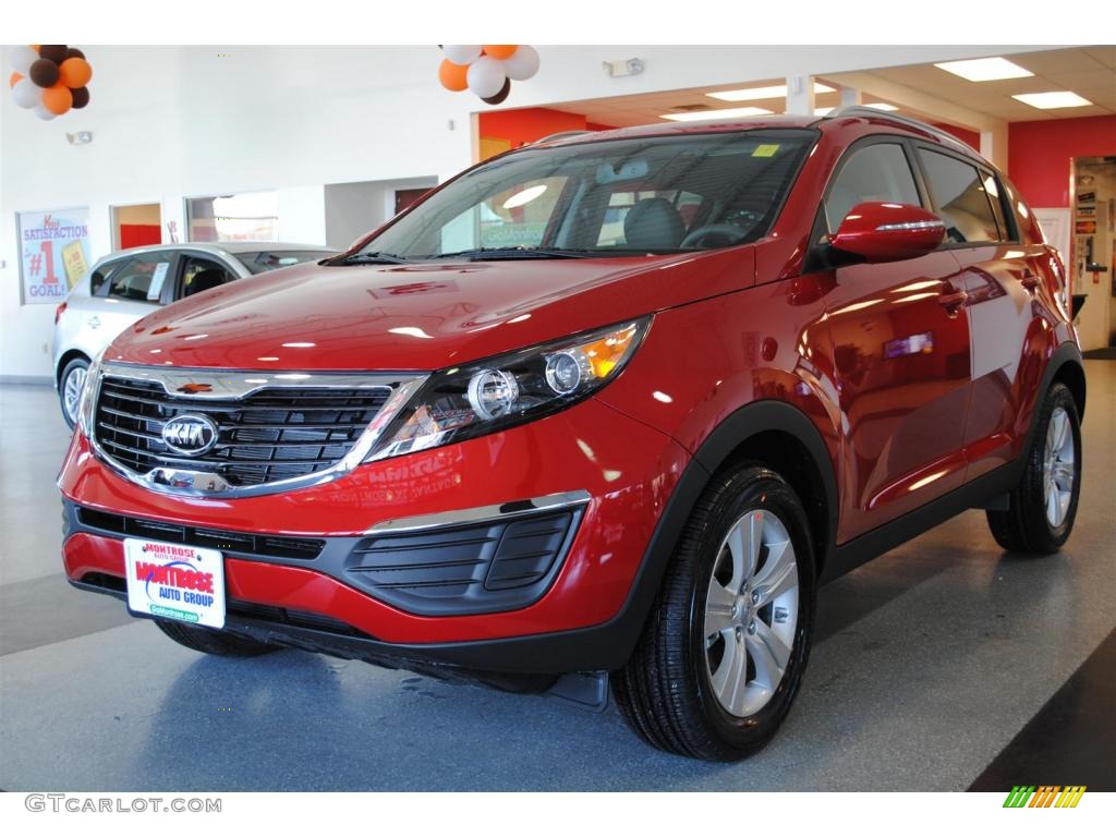 2011 Sportage LX - Signal Red / Black photo #2