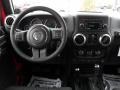 Black 2011 Jeep Wrangler Unlimited Sahara 4x4 Dashboard