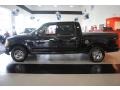 2002 Black Ford F150 XLT SuperCrew  photo #2