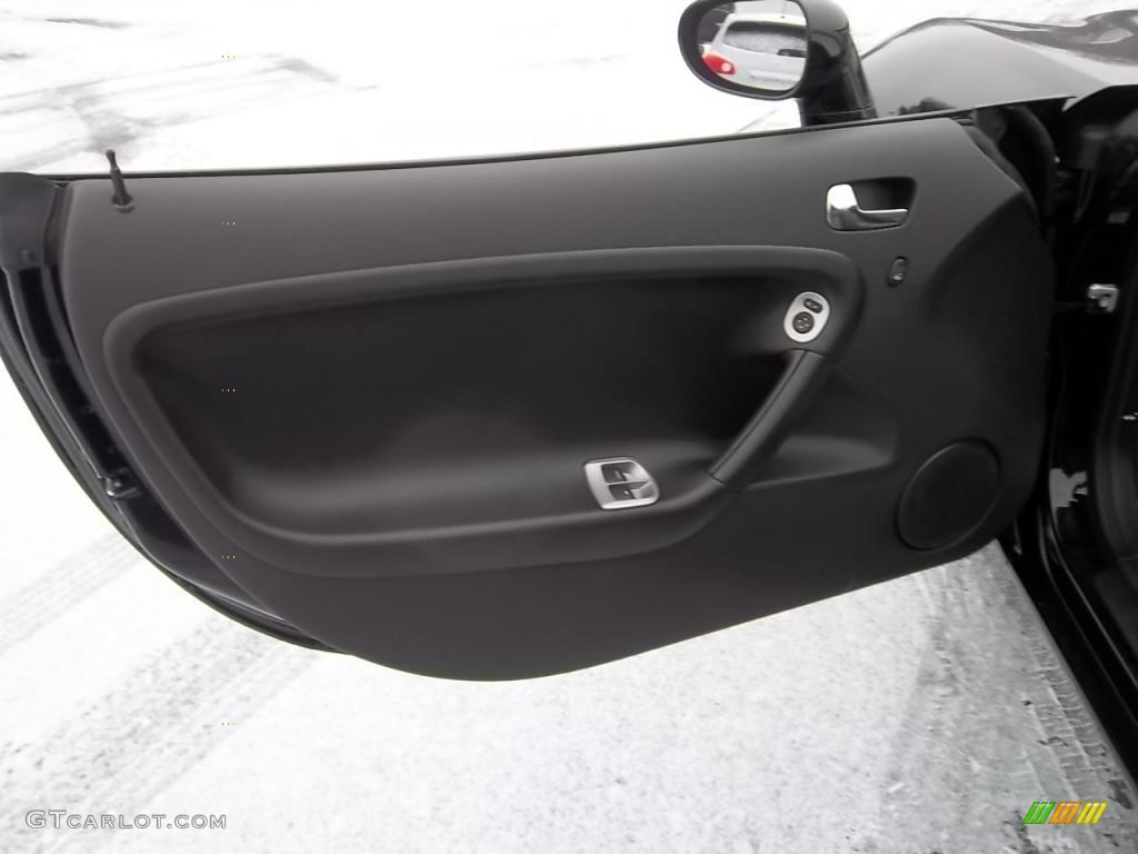 2009 Pontiac Solstice Roadster Ebony Door Panel Photo #43989092